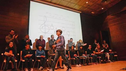 Gabriel receiving the poster contest award